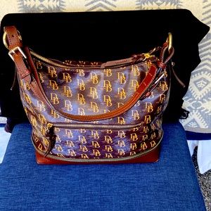 Vintage Dooney & Bourke Timoro leather trimmed hobo bag